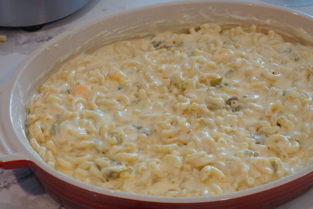 Casserole dish with green chile mac and cheese.