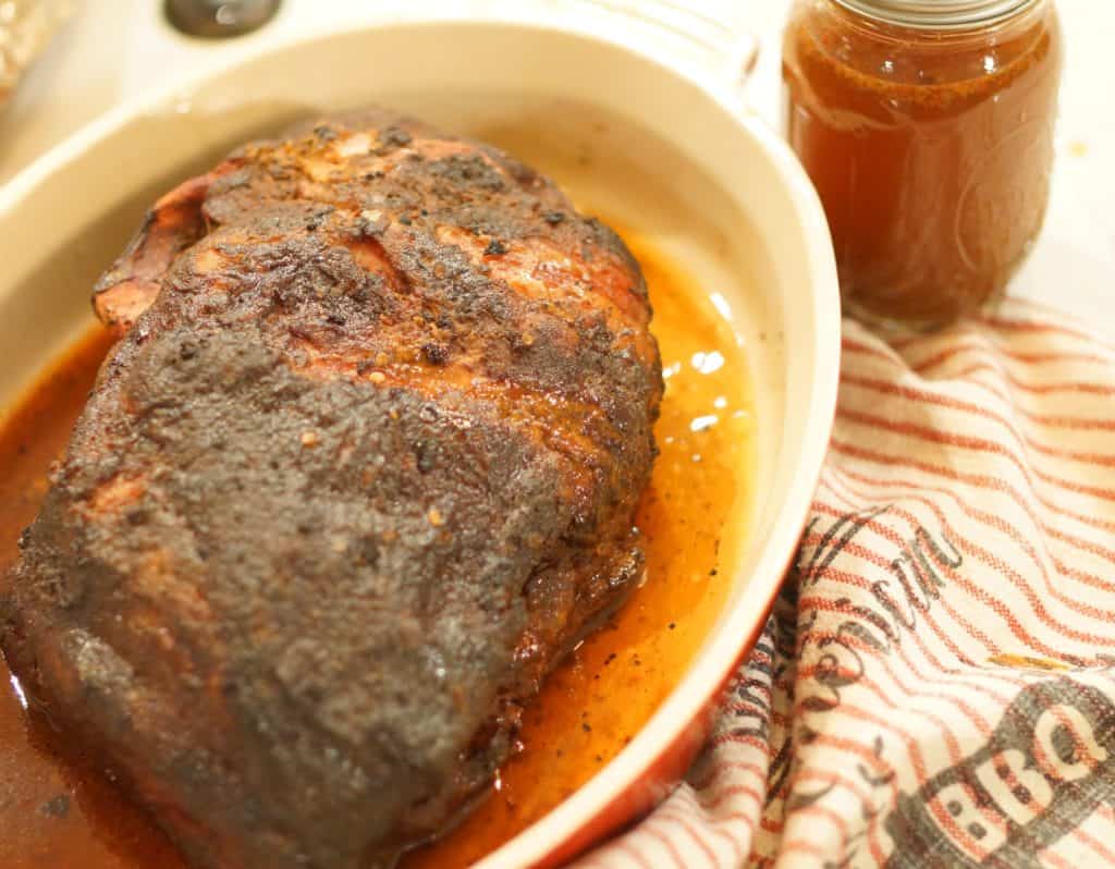 Smoked pork butt in a dish.