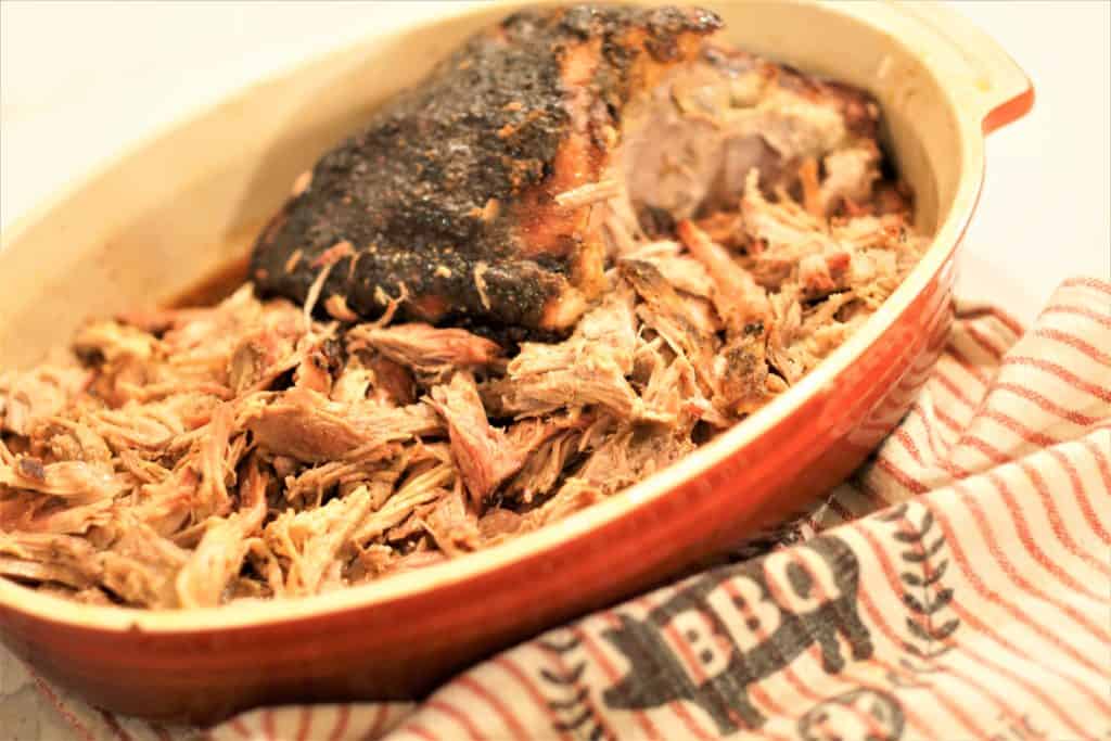 Shredded pulled pork in a dish.