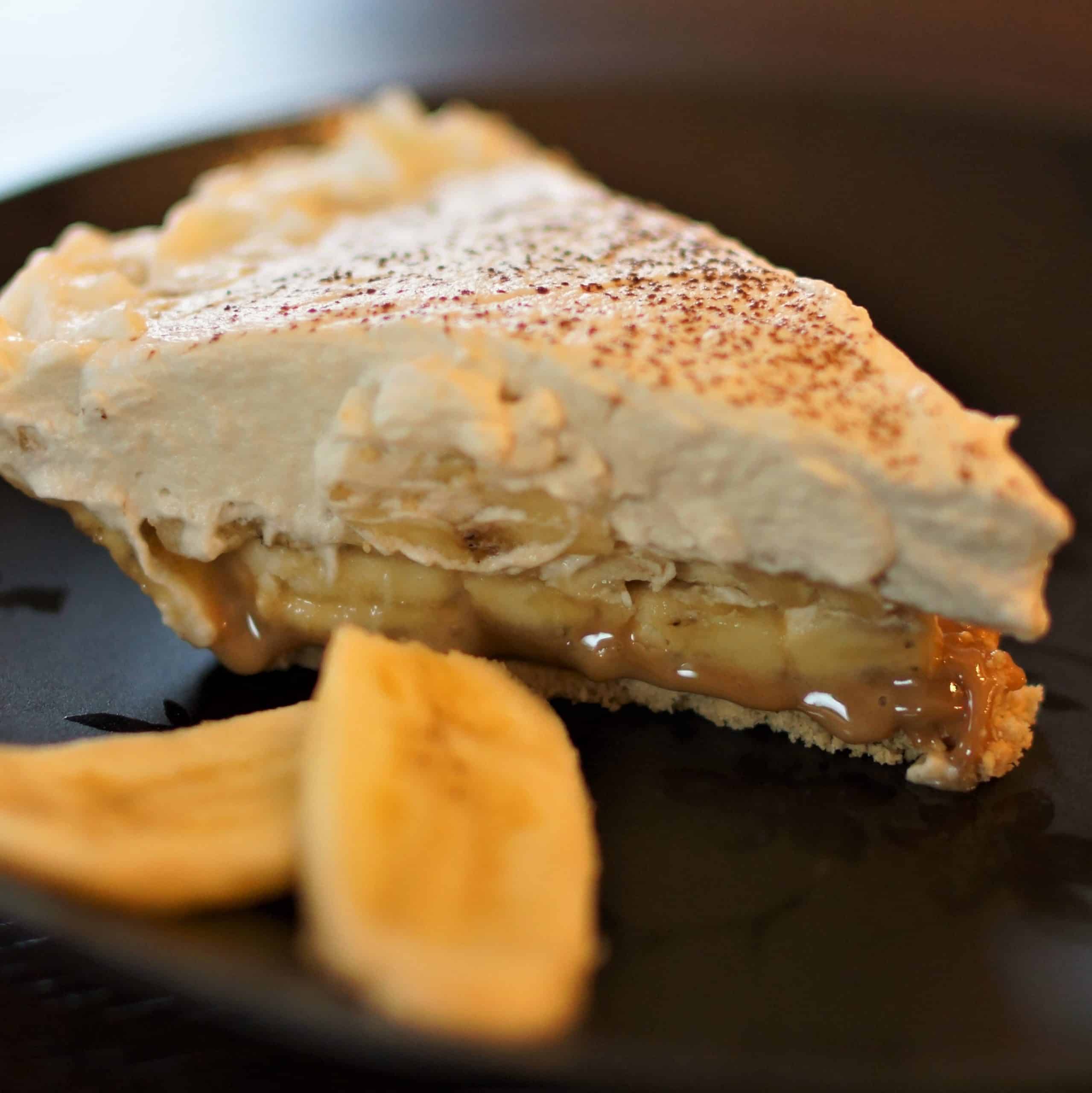 Slice of banoffee pie with caramelized bananas.