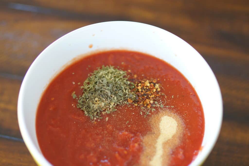 Homemade pizza sauce in a bowl.