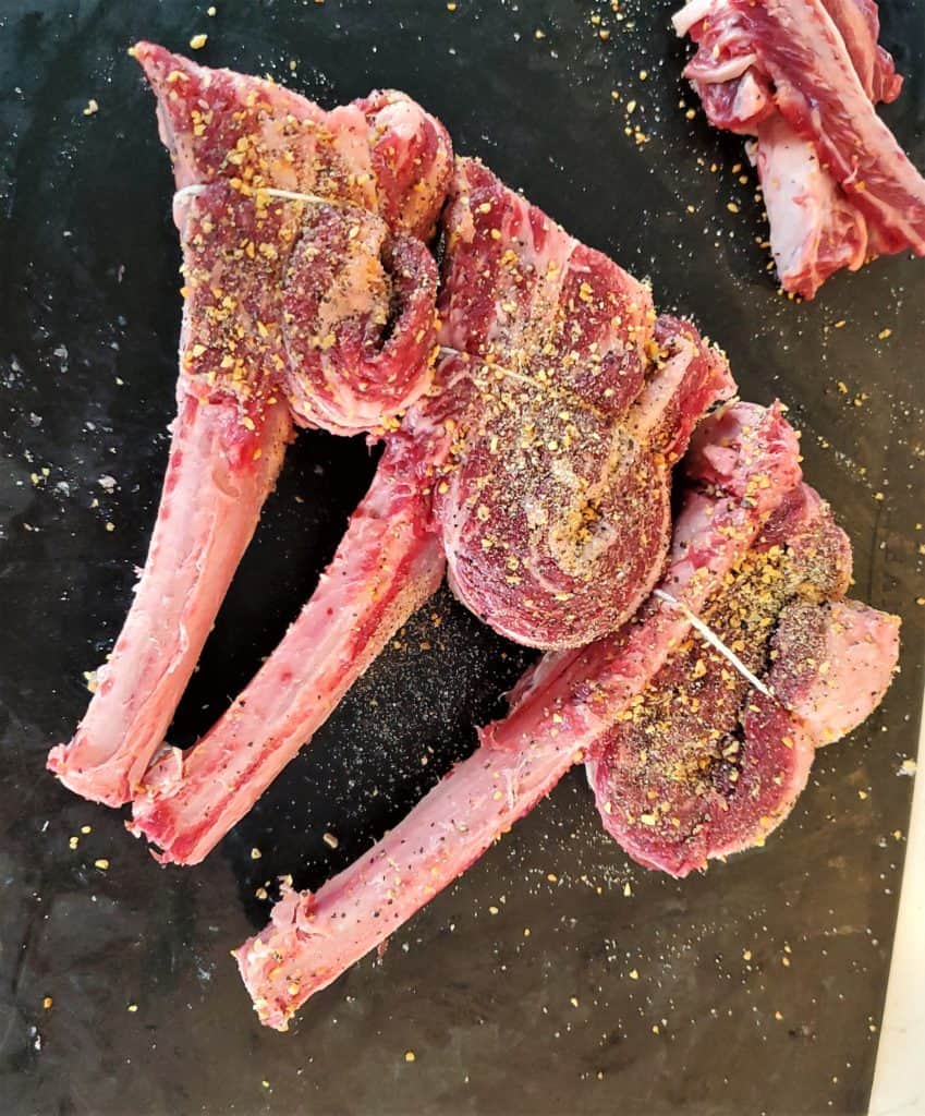 Beef short ribs formed into tomahawks and seasoned with salt, pepper, and garlic.
