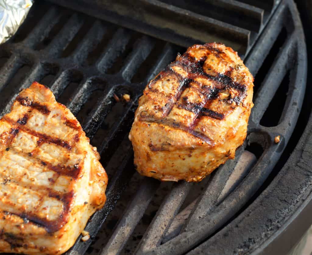 Grilled pork chops on a Big Green Egg.