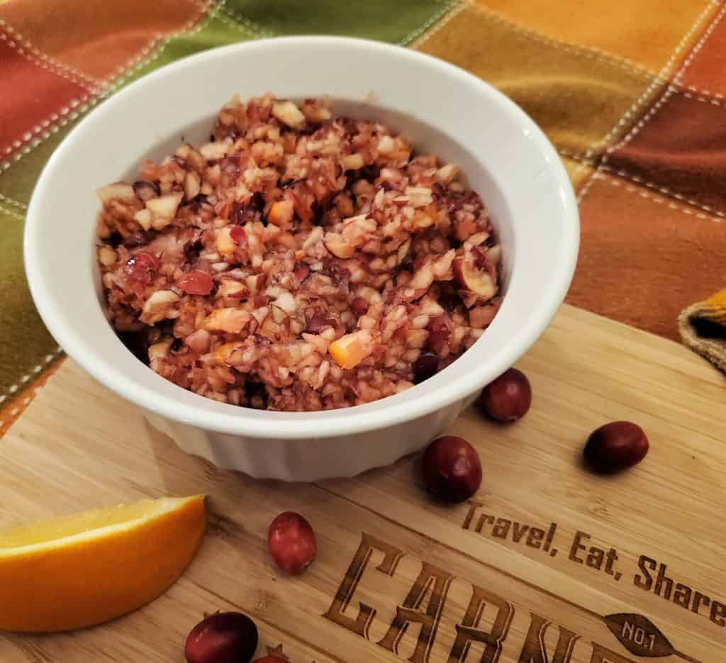 White bowl with Thanksgiving cranberry salad.