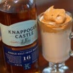 Glass if Irish Coffee Dalgona with a bottle of Knappogue Irish Whiskey.