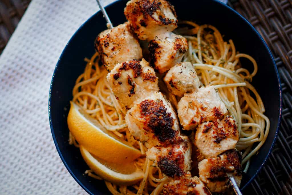 Grilled Chicken Spiedini served over angel hair pasta.