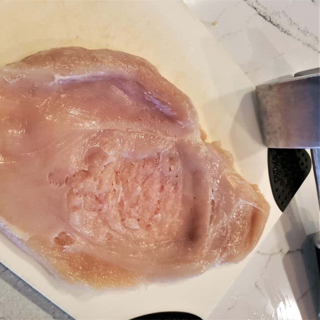 Chicken breast pounded thin with a meat mallet.