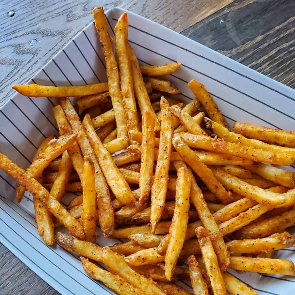 Plate of crispy French Fries.