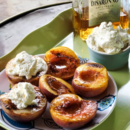 Grilled peaches with Amaretto whipped cream.