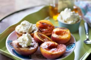 Grilled peaches with amaretto whipped cream.