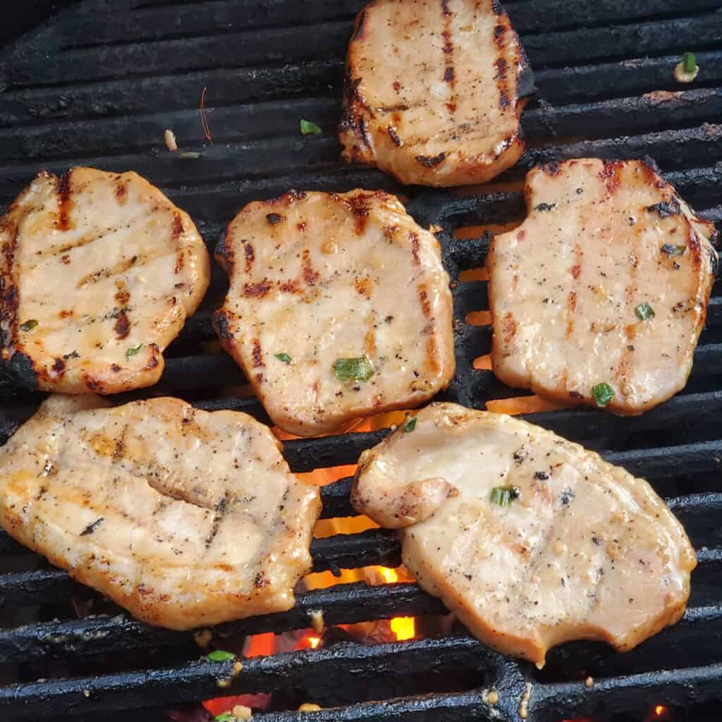 Grilled pork loin on a grill.