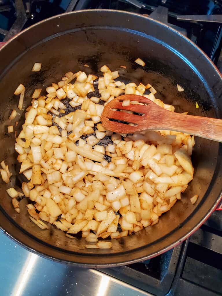 Onion cooking in a Dutch oven.
