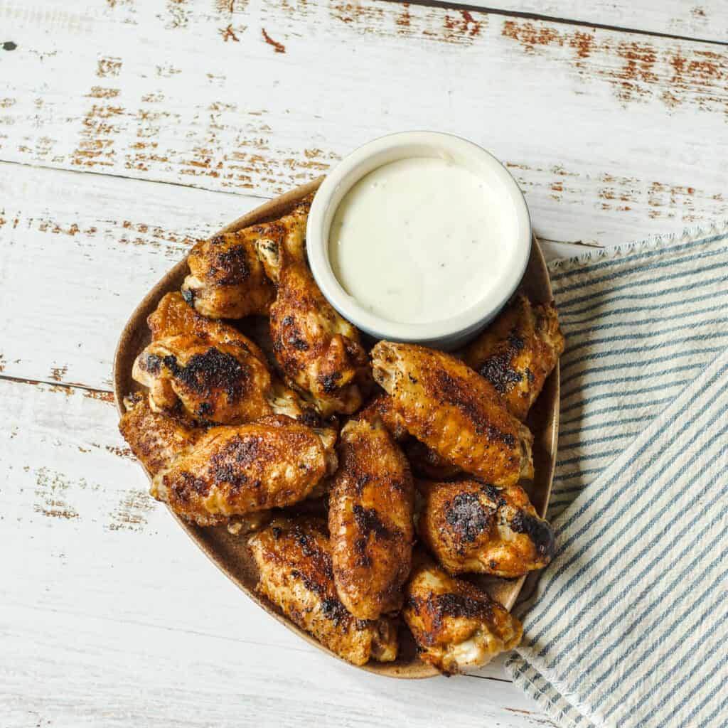 Dry rubbed buffalo style wings with served with blue cheese dressing.