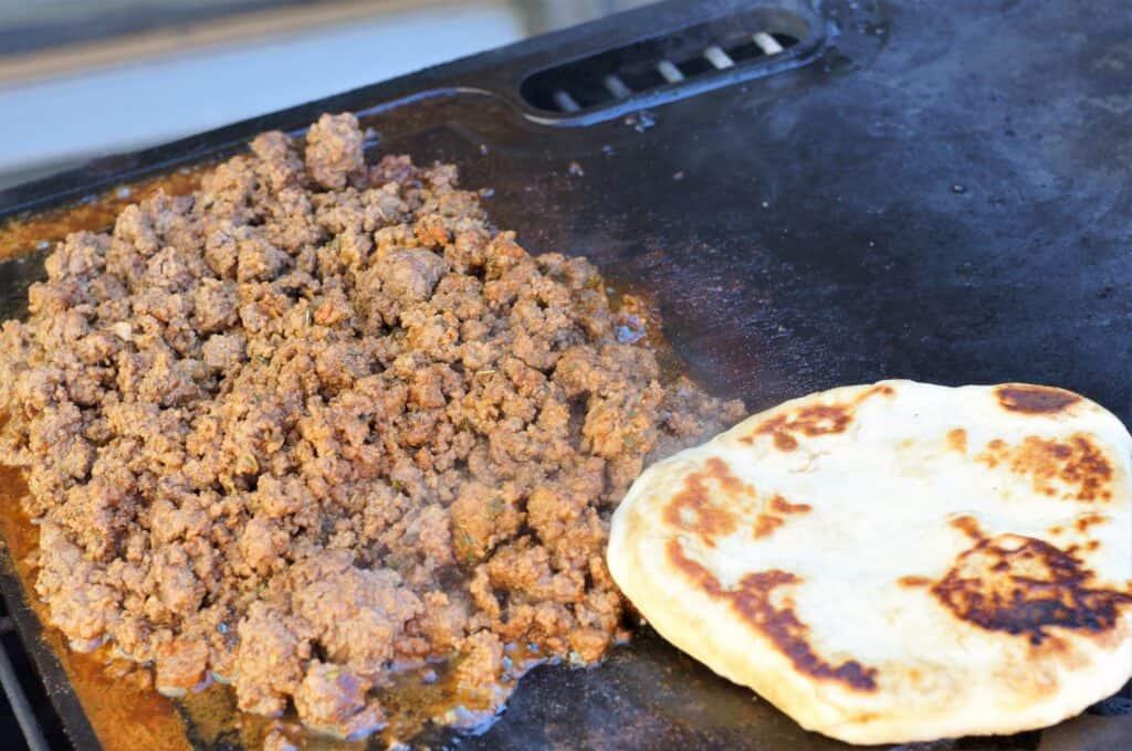 Navajo tacos on a flattop grill.