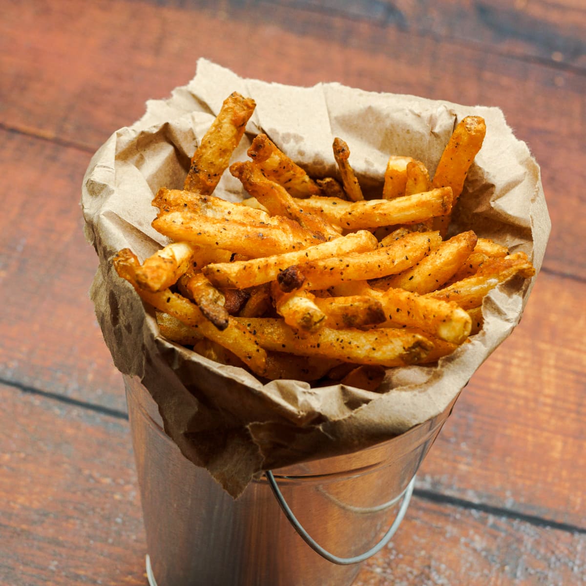 Bucket with crispy French Fries.