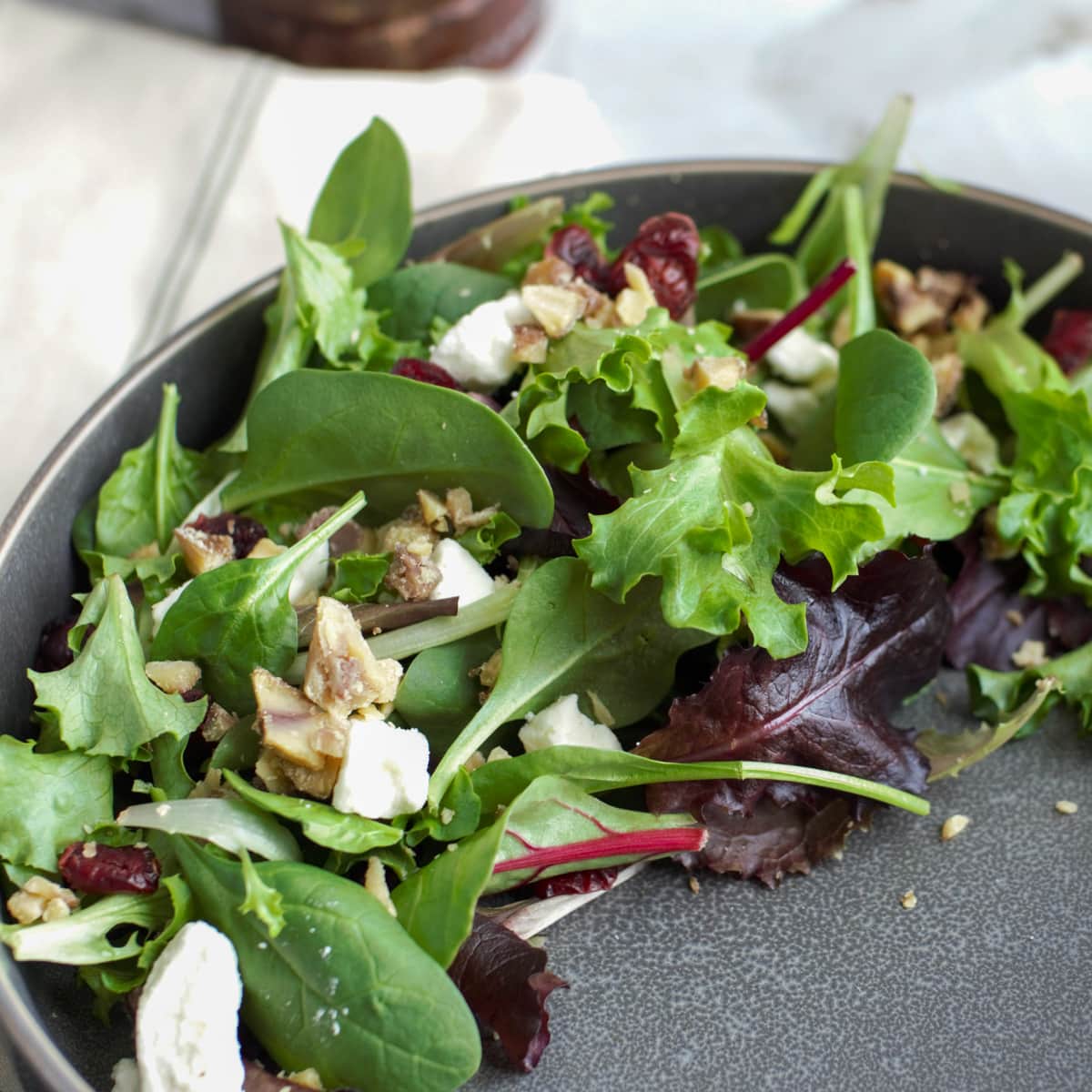 Christmas Salad with feta, chestnuts, and cranberry balsamic vinaigrette.