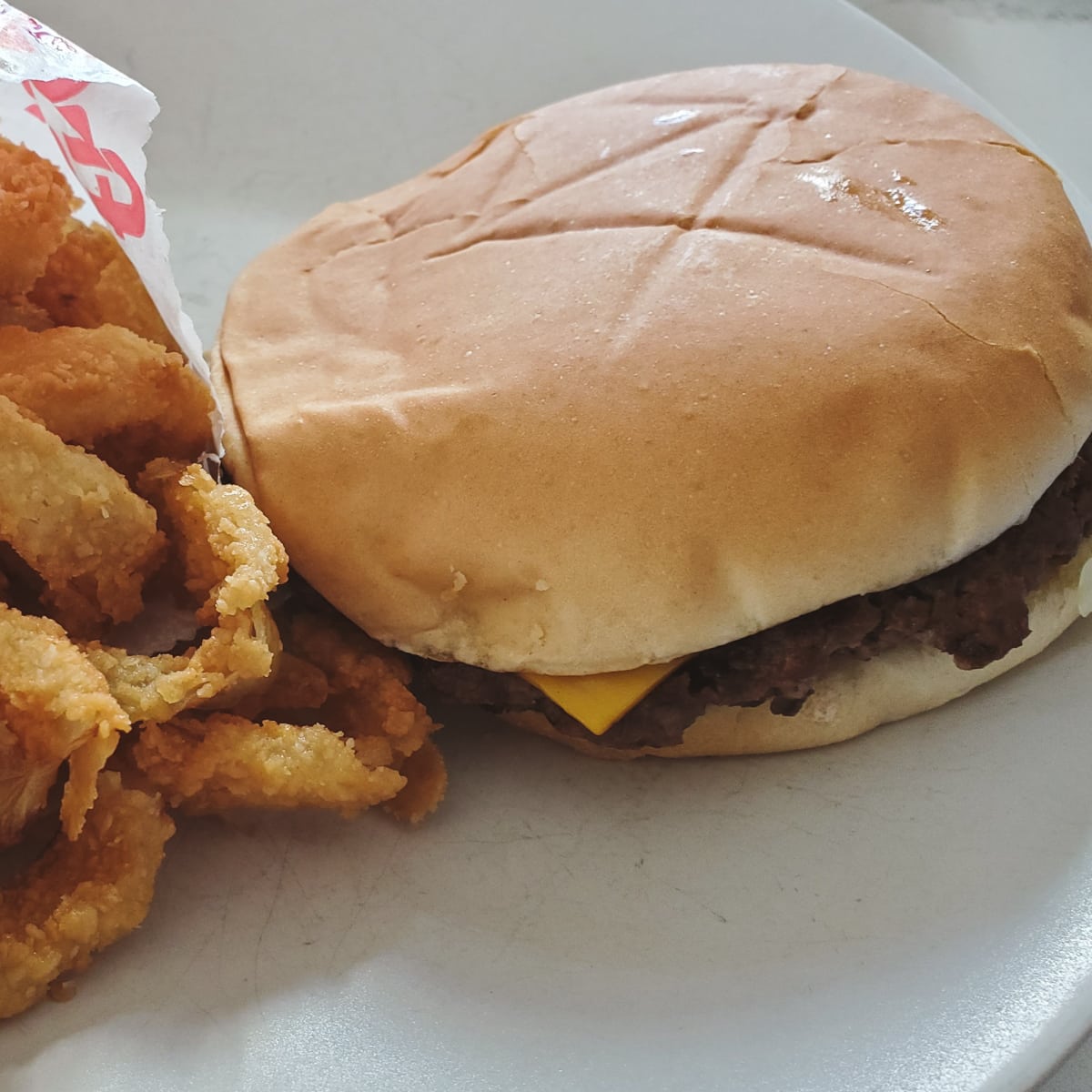 Big Boy Burger and onion rings from Paul's Drive-In in South Kansas City.