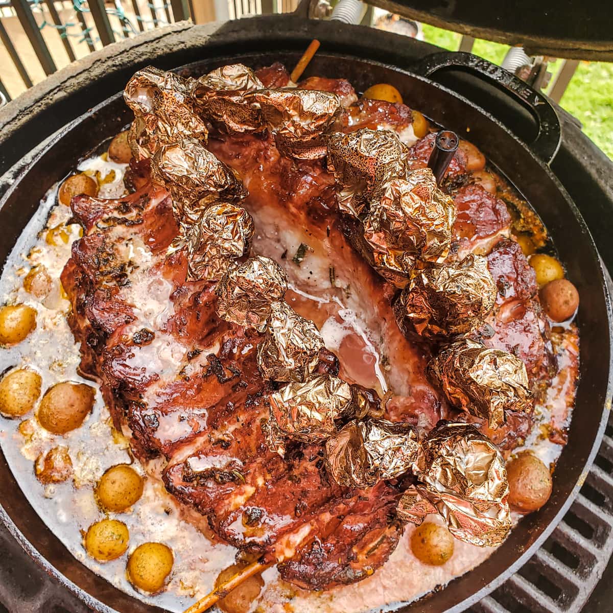 Crown of pork cooking on a Big Green Egg.