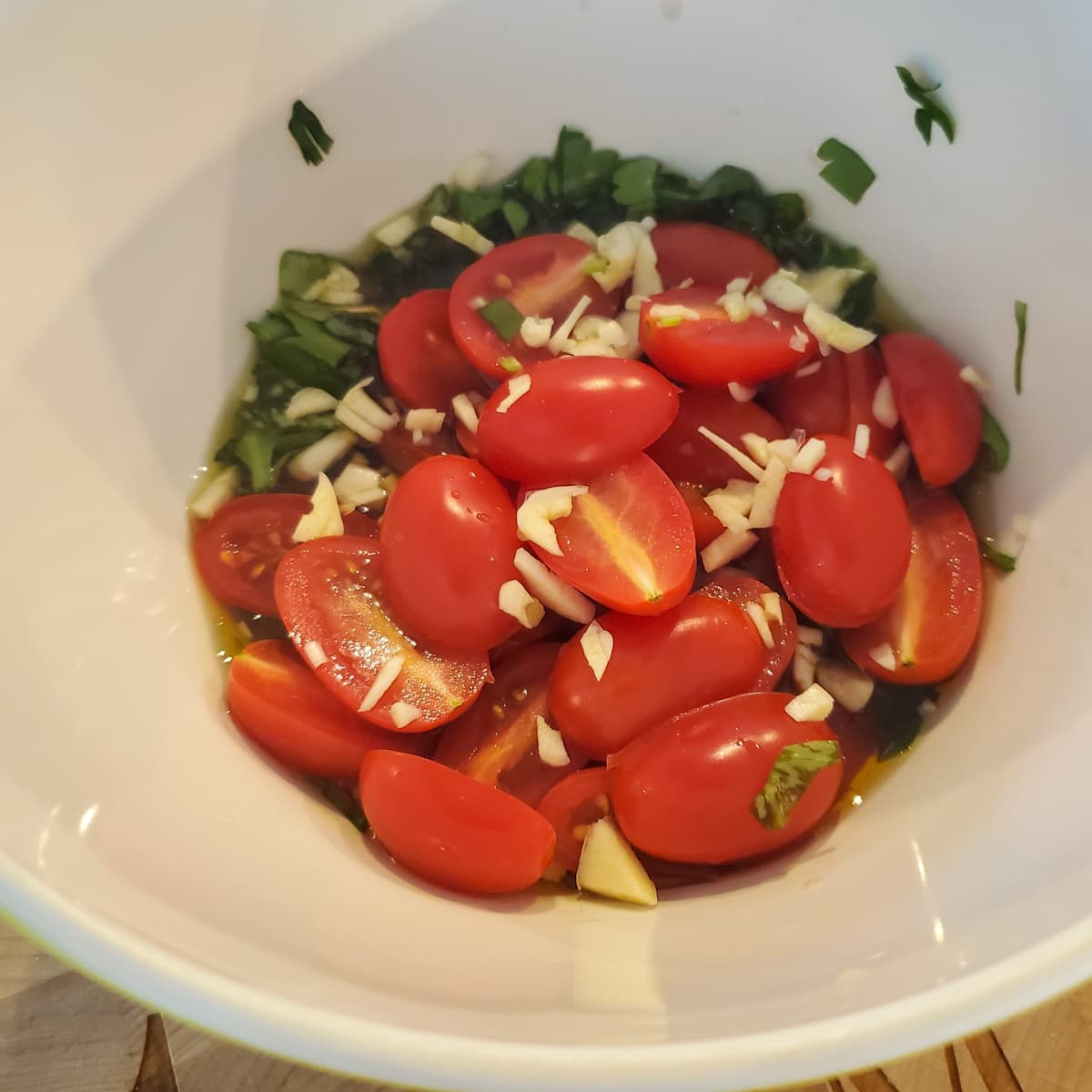 Dressing with tomatoes for panzanella salad.