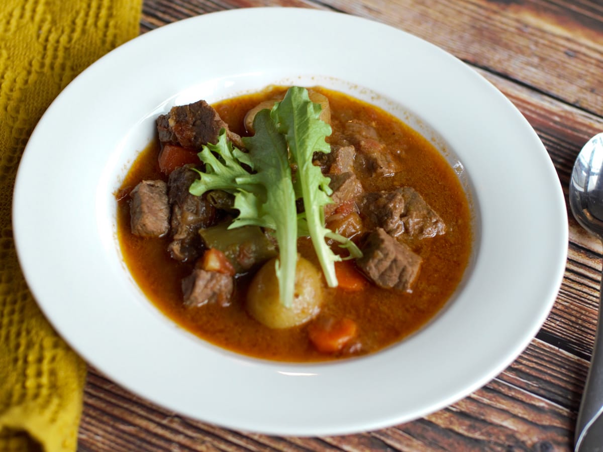 White bowl with Caribbean Beef Stew.