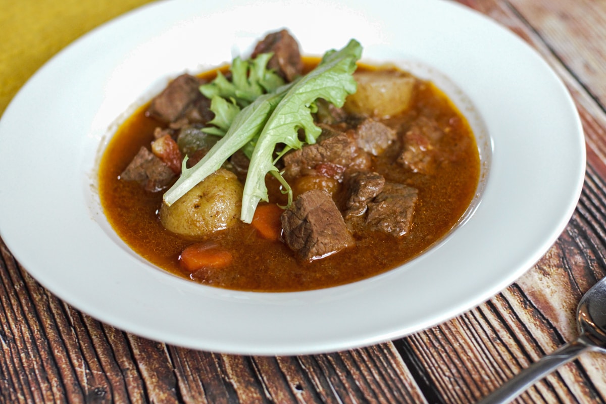 A bowl of Karni stoba, a beef stew famous in the Dutch Antilles.