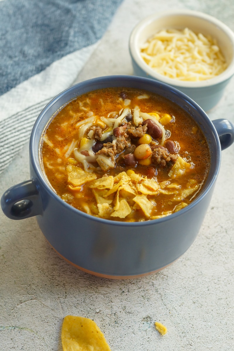Blue bowl with Tex Mex taco soup.