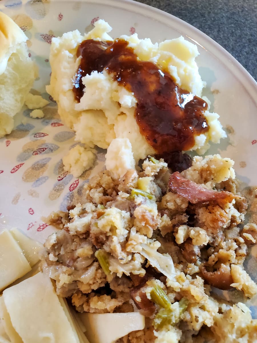 Neck and giblet gravy over mashed potatoes and stuffing.