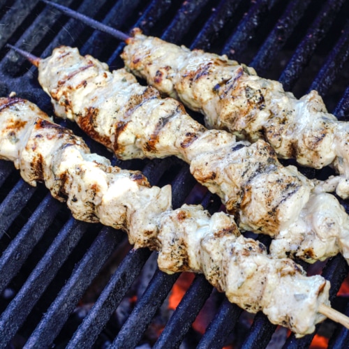 Greek Chicken Souvlaki on a grill.