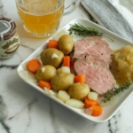 Austrian tafelspitz served with potatoes, apple-horseradish sauce, and beer.