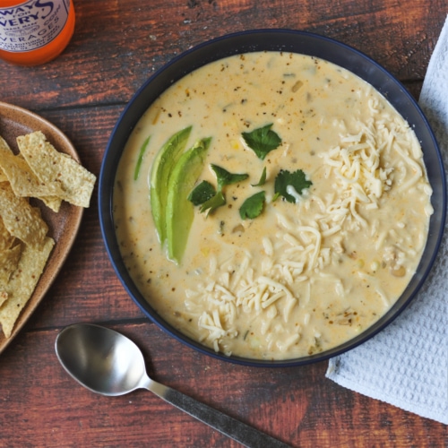 Blue bowl with white chicken chili.