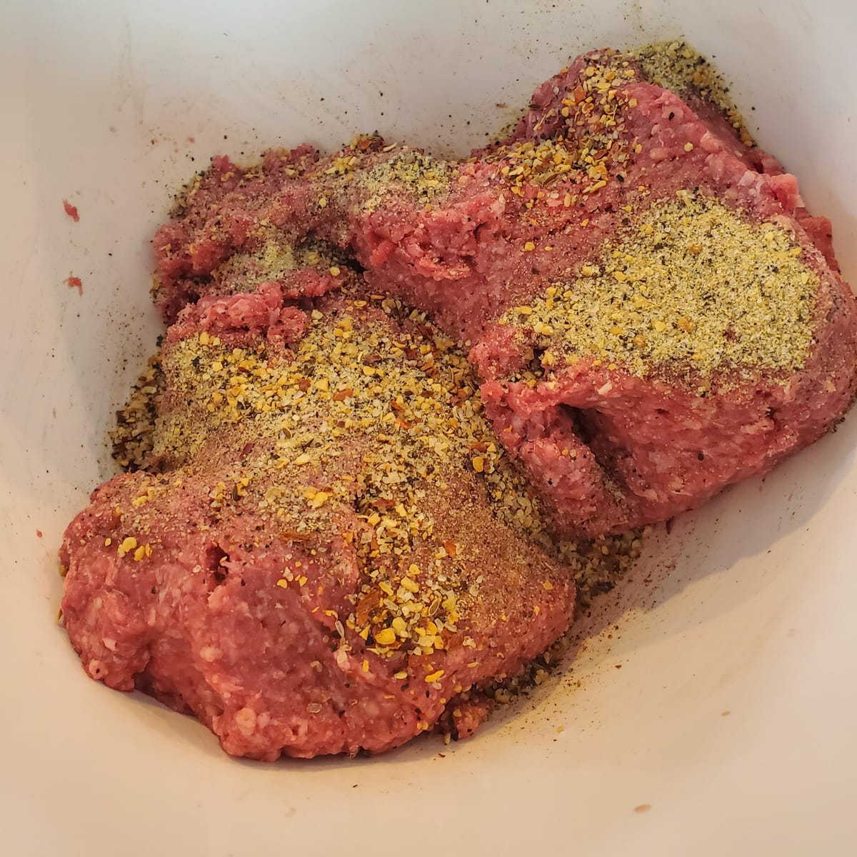 Ground beef seasoned with burger seasoning.