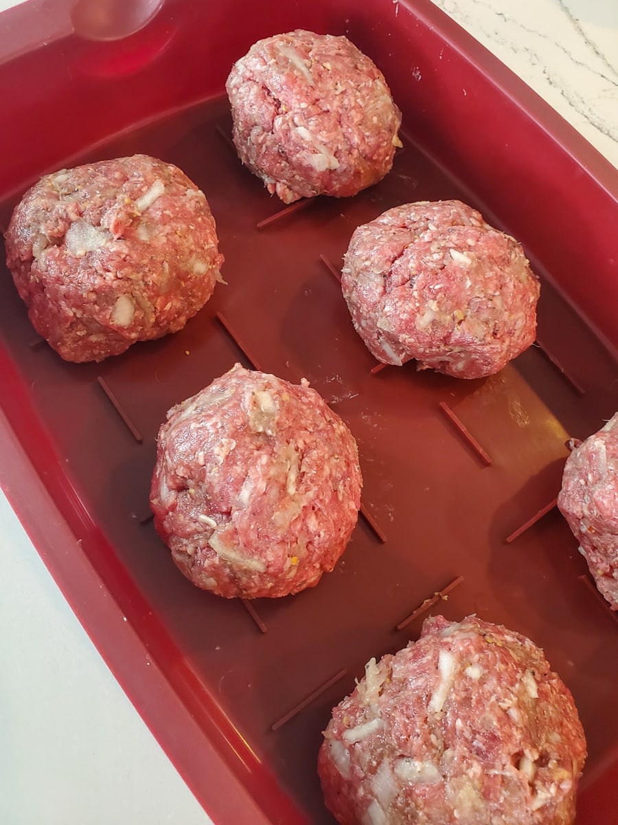 Container with 8-ounce balls of ground beef.