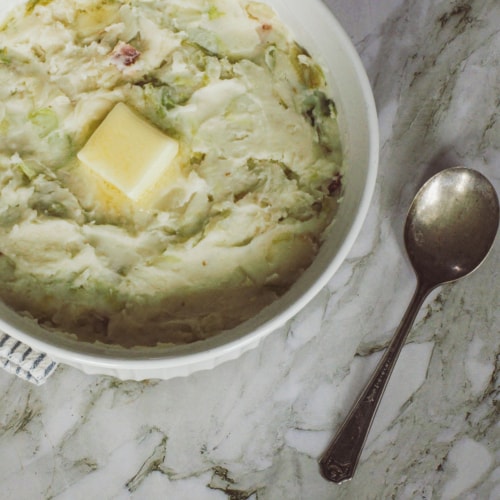 Bowl of Irish Colcannon with bacon.