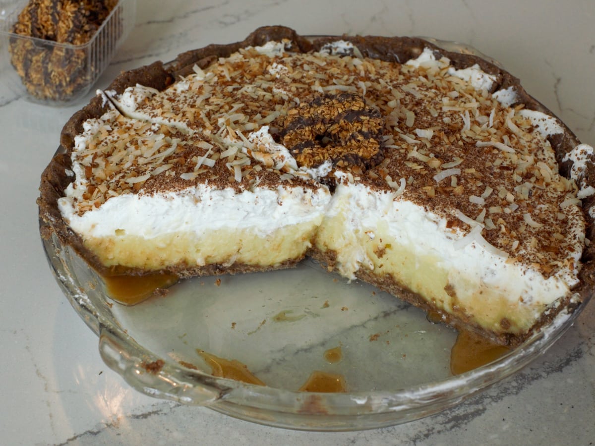 Chocolate and caramel coconut cream pie made with Samoas Girl Scout Cookies.