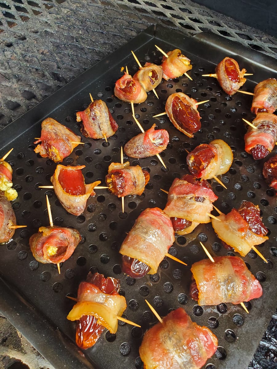 Smoked Devils of Horseback: Bacon wrapped dates on a smoker.