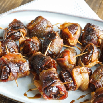 Grilled bacon wrapped dates stuffed with chorizo, drizzled with balsamic vinegar.