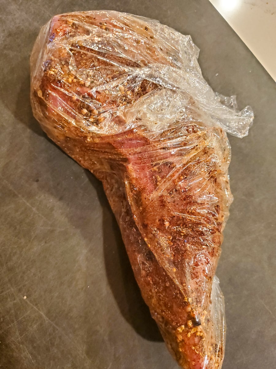 Beef tongue wrapped in plastic wrap.