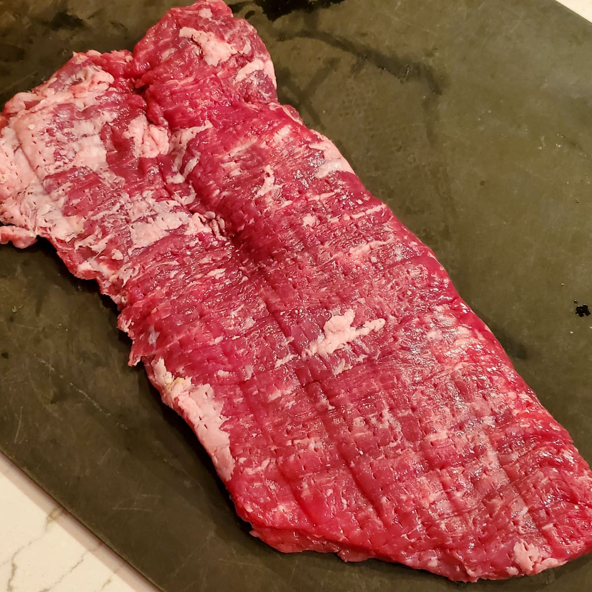 Blade tenderized skirt steak.