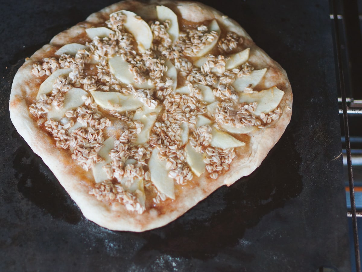 Apple crisp dessert pizza in a home oven with a Cooking Steel.