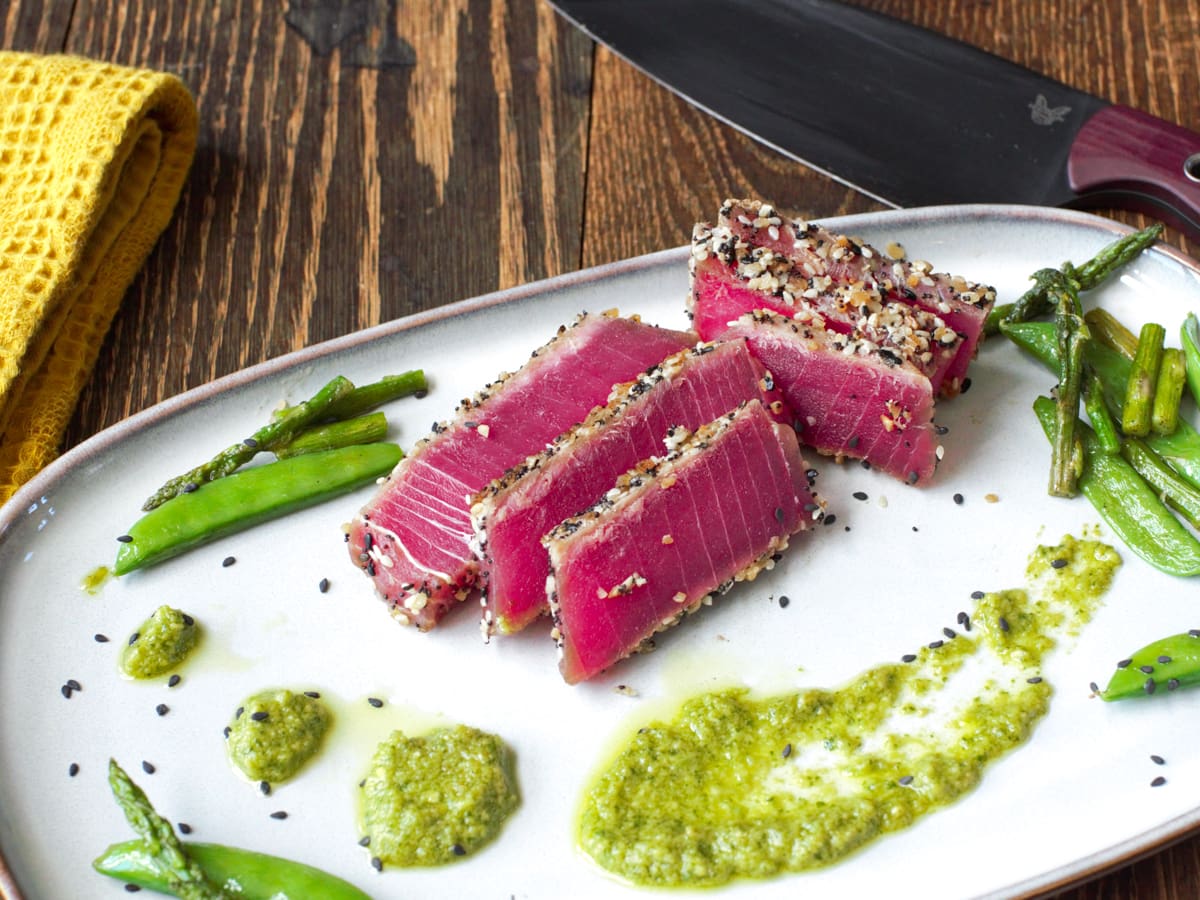 Everything bagel crusted ahi tuna served with a Jalapeno-avocado sauce.