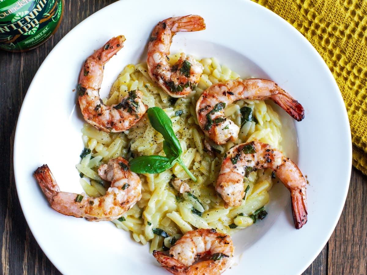 Grilled shrimp served with Mediterranean style orzo.