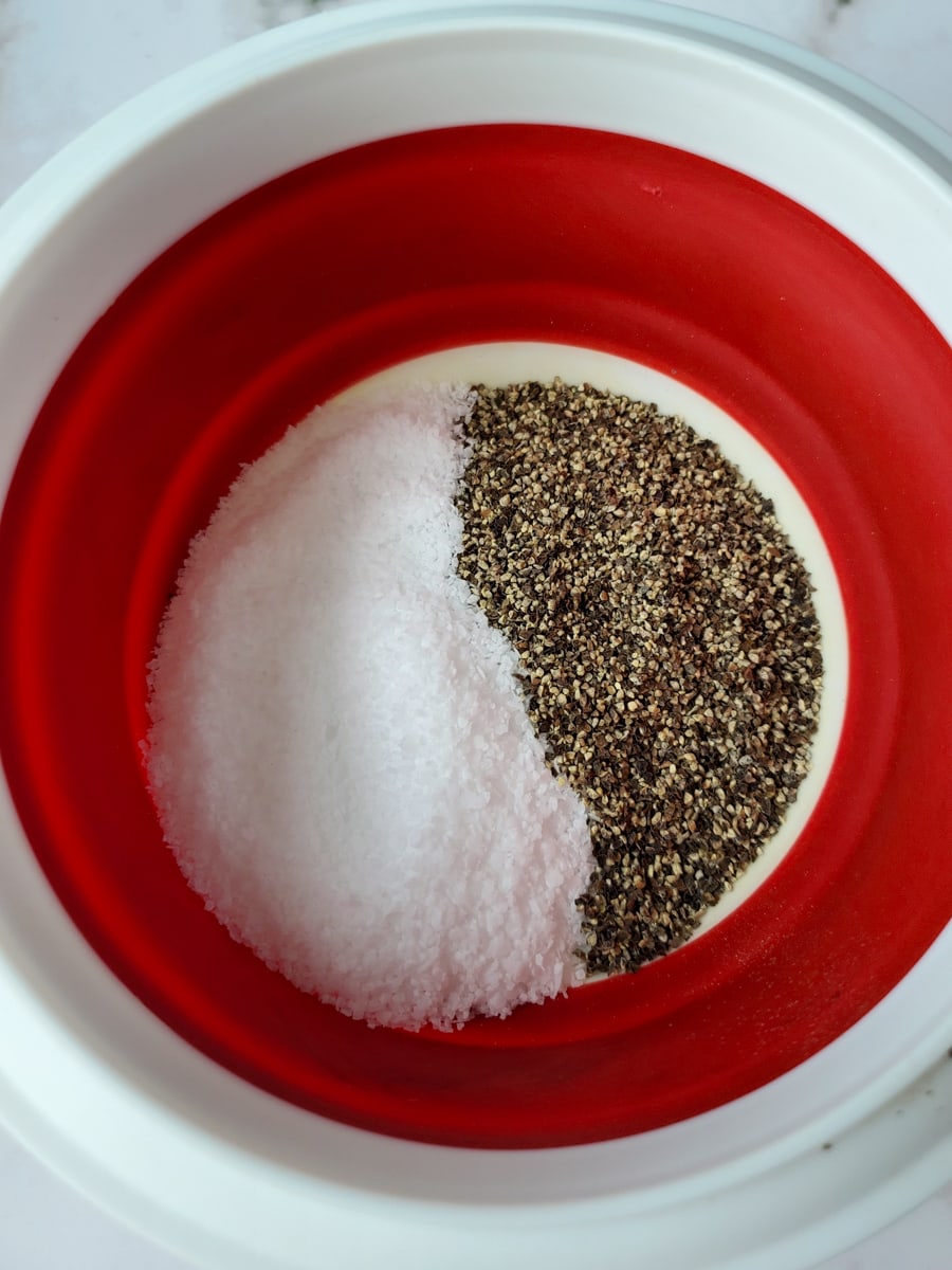 Coarse salt and pepper for seasoning a Texas style brisket.