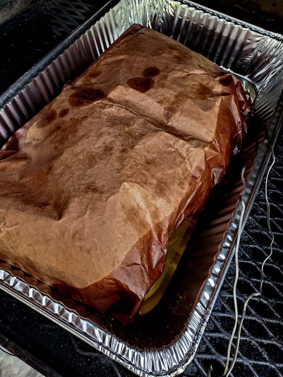 Texas style brisket wrapped in peach paper.