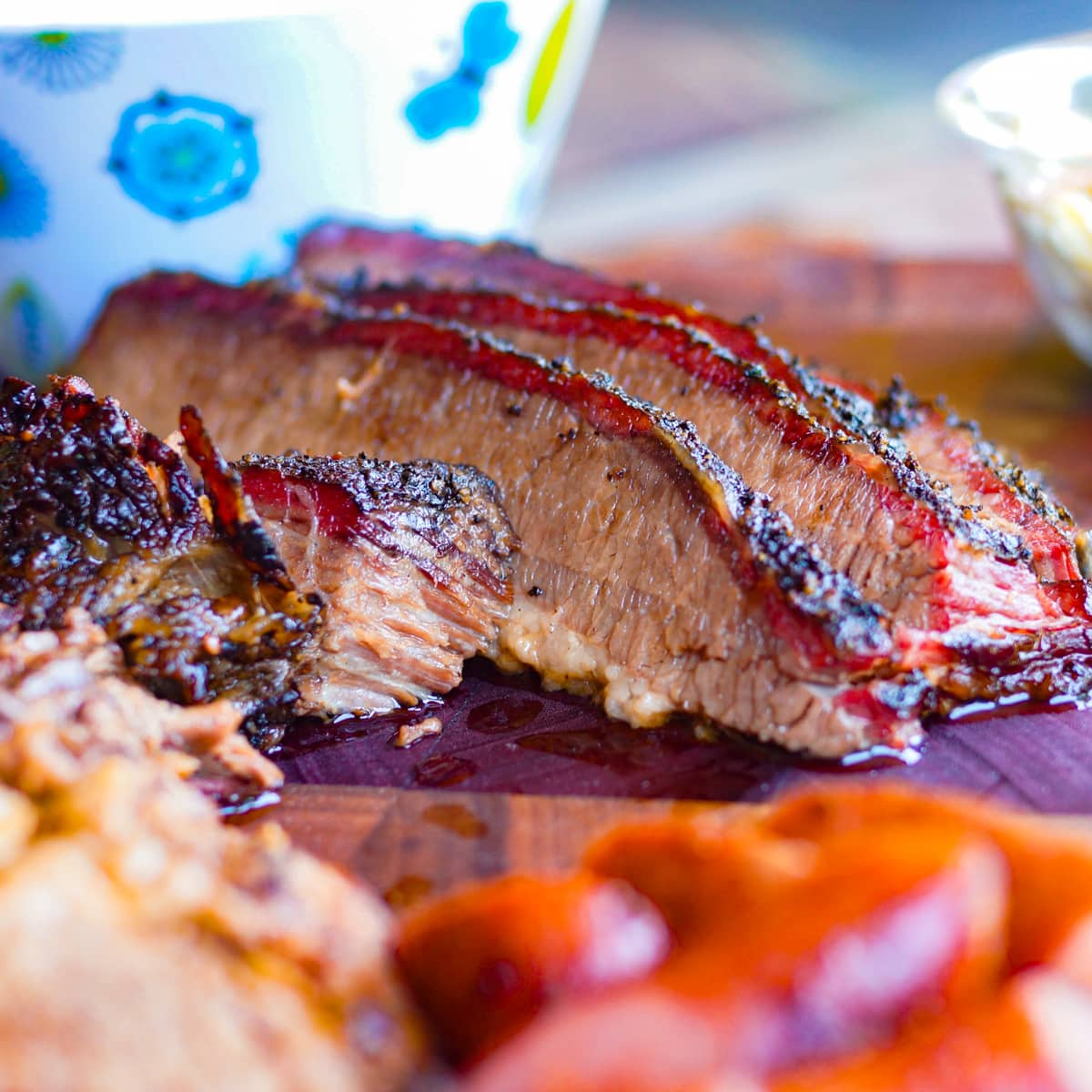 Slices of brisket with a nice smoke ring.