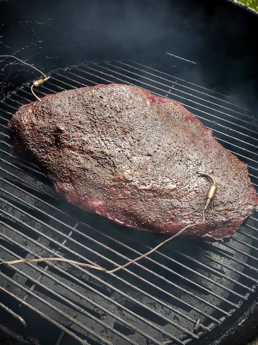 Texas Style smoked brisket on a smoker.