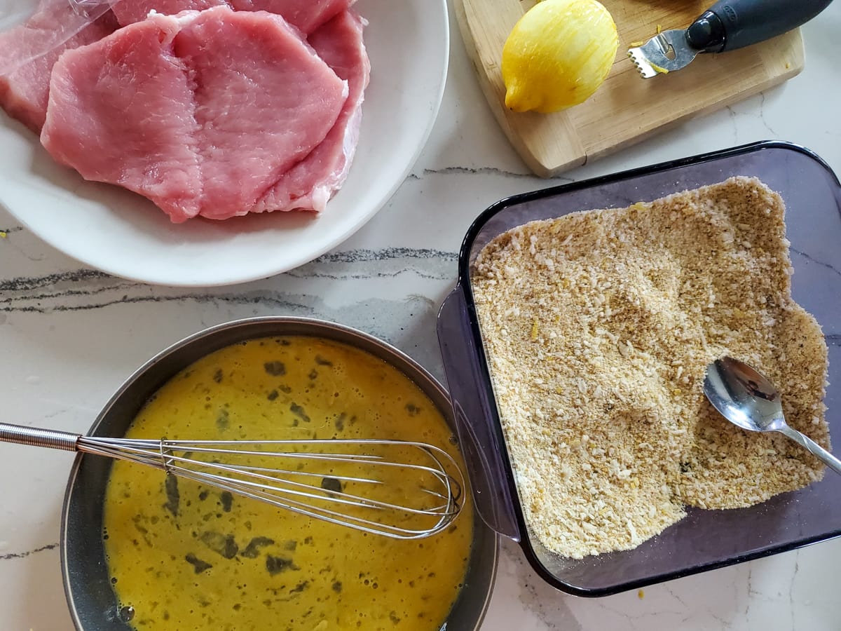 Prepping to make pork Milanese.