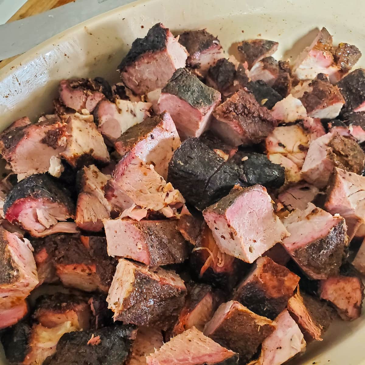 Cubed smoked pork butt for burnt ends.