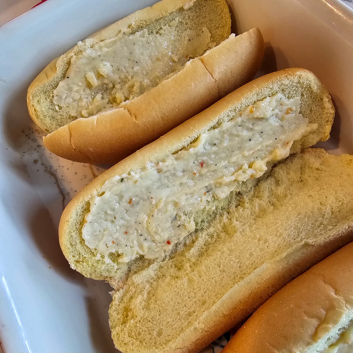 Sub rolls with garlic butter.