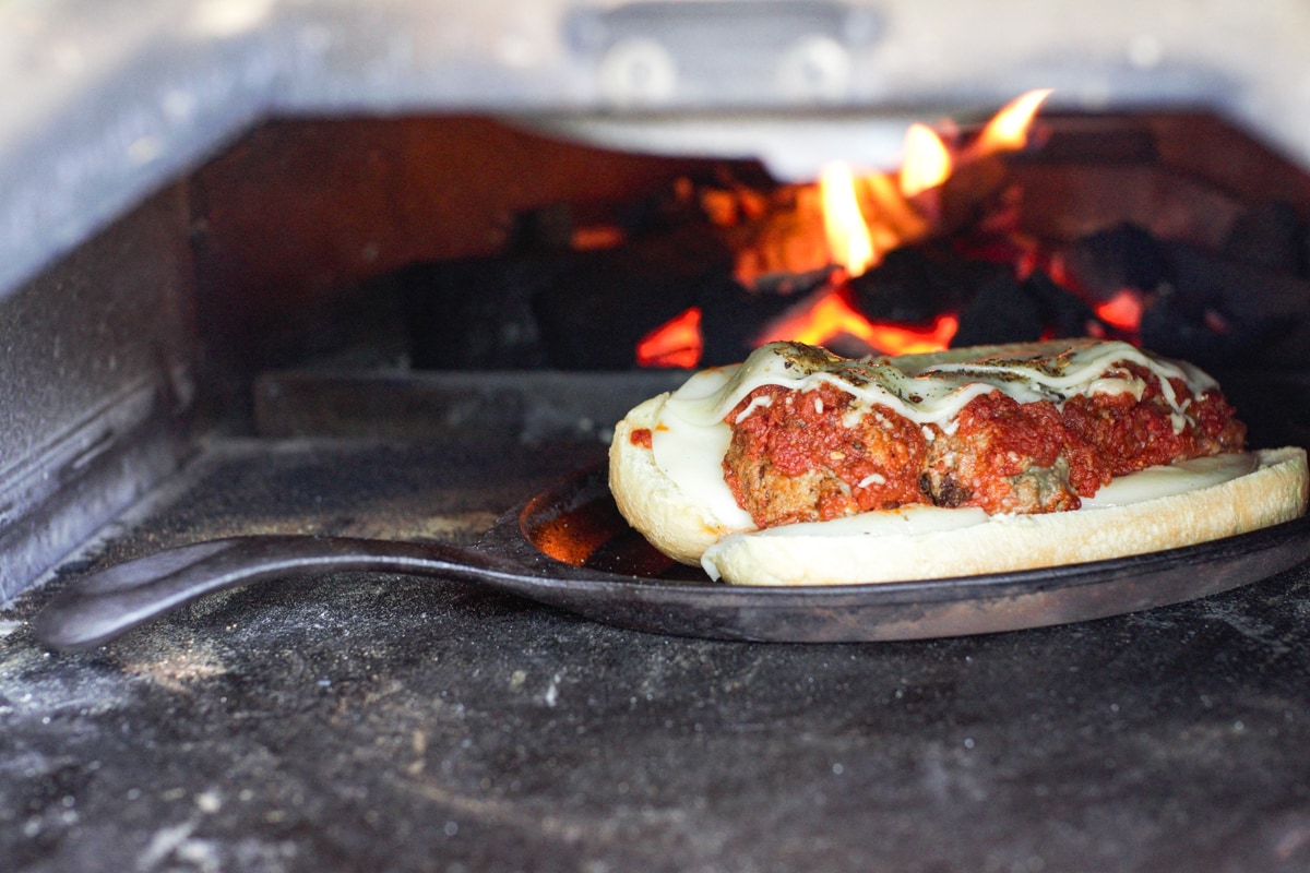 Ooni pizza oven with a meatball grinder.