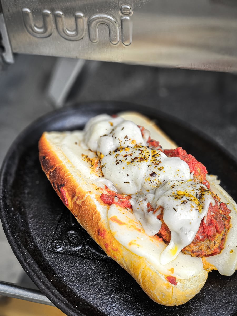 Meatball sub cooked in an Ooni pizza oven.